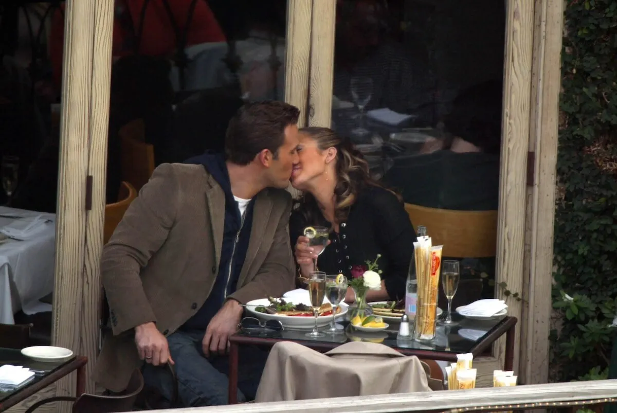 Ben Affleck and Jennifer Lopez sneak a kiss in 2002