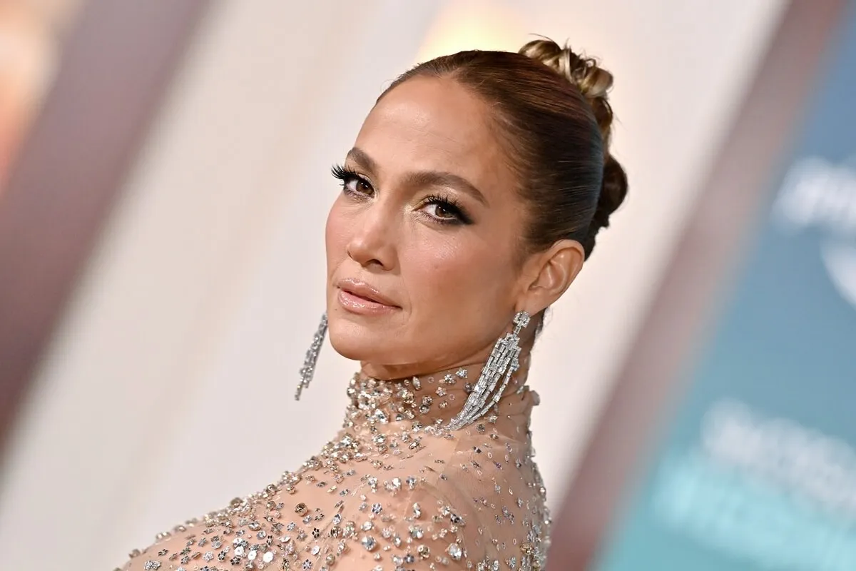 Jennifer Lopez attends the Los Angeles Premiere of Prime Video's "Shotgun Wedding" in a glittering silver dress.