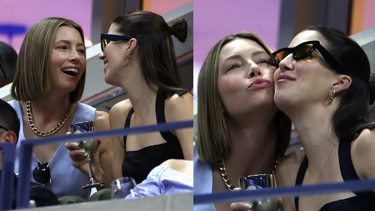 Wearing a light blue suit set, Jessica Biel and her friend watch the U.S. Open from her box seat