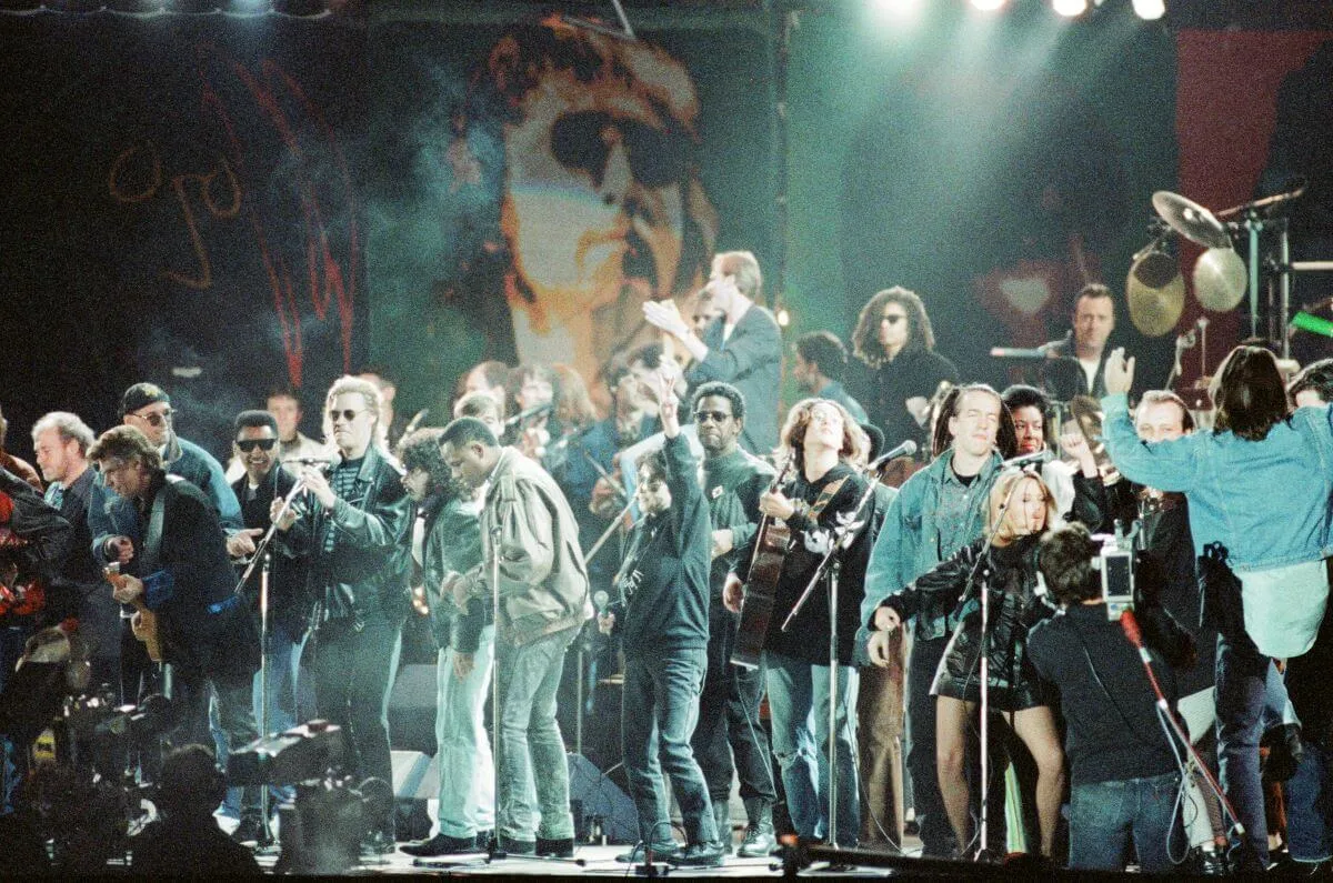 Musicians on the stage of the John Lennon tribute concert in Liverpool.