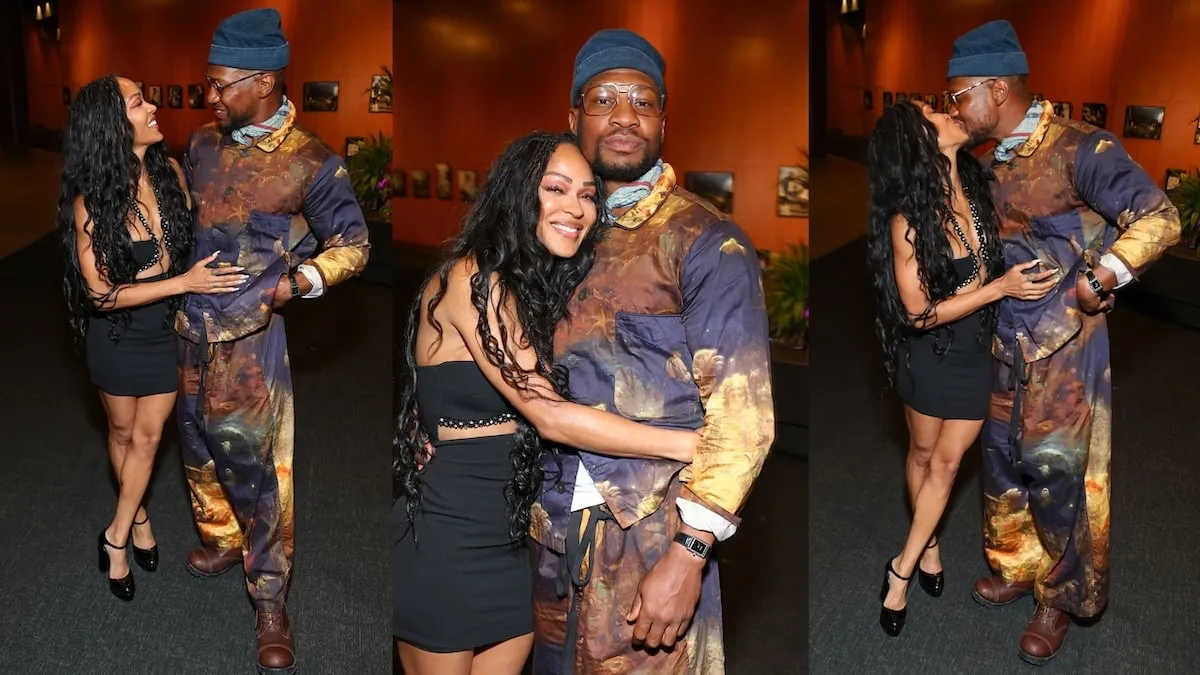 Couple Meagan Good and Jonathan Majors hold each other and kiss at the 'Forever' premiere