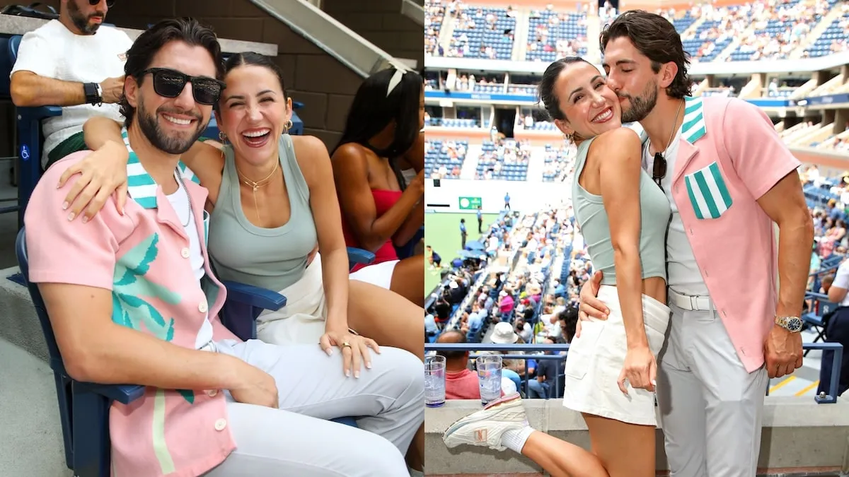 Reality star Jason Tartick kisses influencer Kat Stickler on the cheek at the U.S. Open