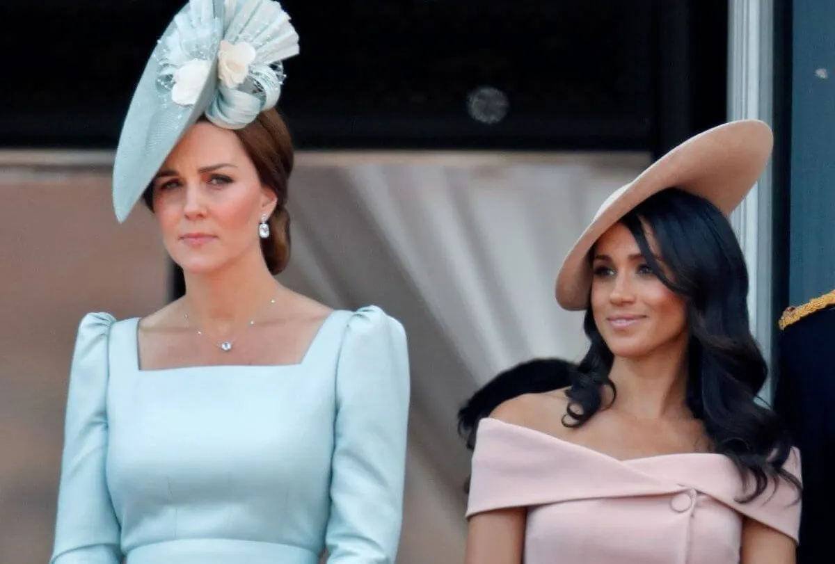 Kate Middleton and Meghan Markle standing on the balcony of Buckingham Palace during Trooping The Colour 2018