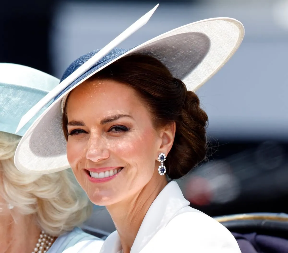 Kate Middleton travels down The Mall in a horse drawn carriage during Trooping the Colour