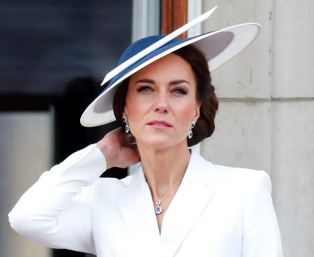 watches a flypast from the balcony of Buckingham Palace during Trooping the Colour