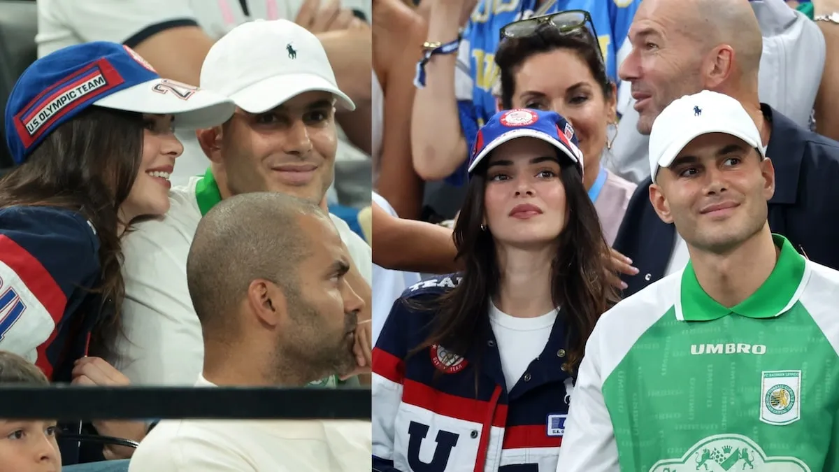 Fai Khadra in a green polo and Kendall Jenner in red white and blue cheer for the U.S. women's gymnastics team at the 2024 Summer Olympics