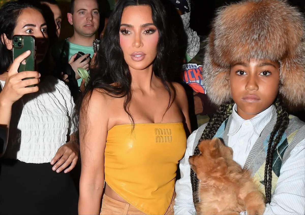 Wearing a yellow outfit, Kim Kardashian and daughter North West are seen out for dinner in NYC