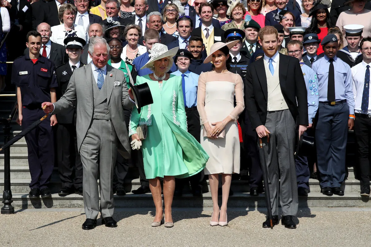 King Charles and Prince Harry, who worry history will repeat itself, with Queen Camilla and Meghan Markle, stand next to each other in 2018.