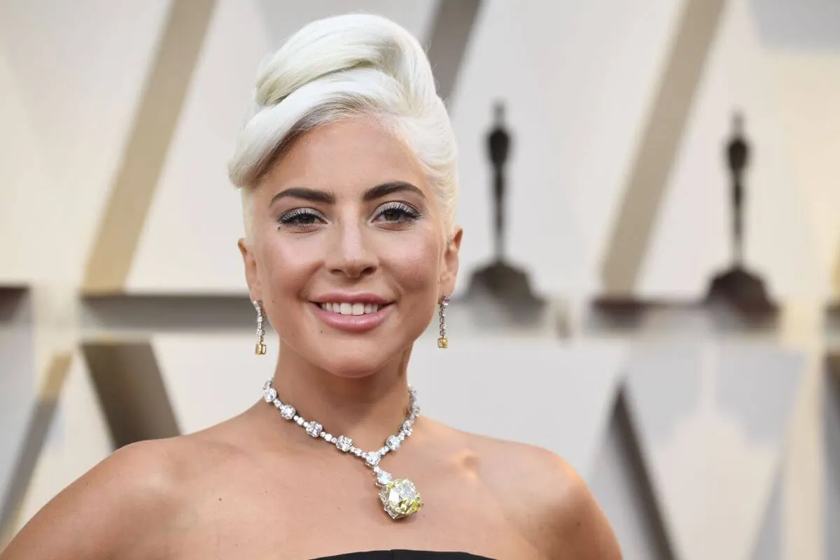 Lady Gaga wears a diamond necklace and earrings at the Oscars.