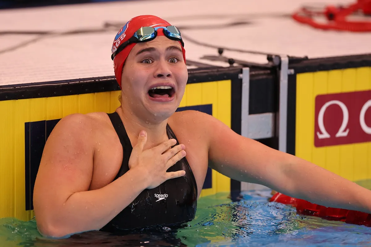 Luana Alonso of Paraguay reacts after winning the Women's 100 Meter Butterfly consolation of the TYR Pro Swim Series Westmont