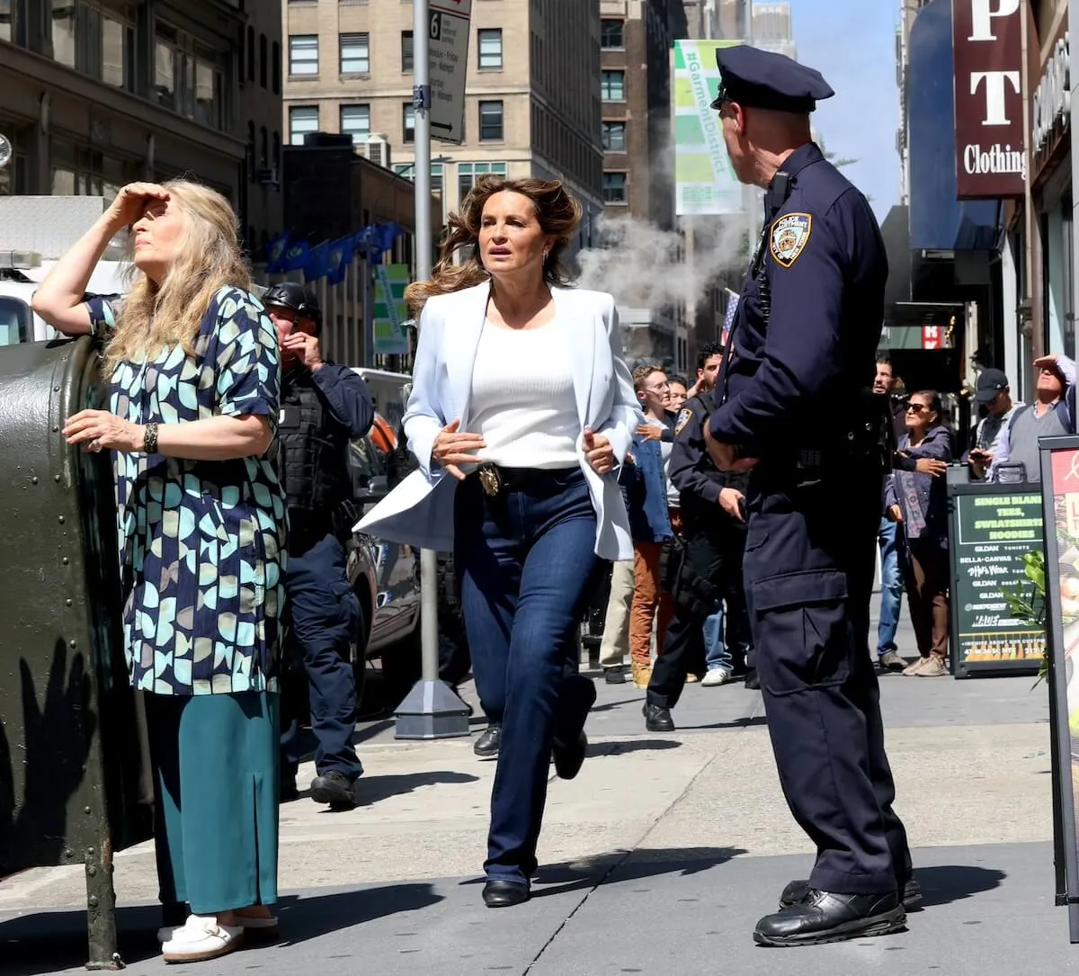 Mariska Hargitay runs down a NYC street on the set of 'Law & Order: SVU' Season 26