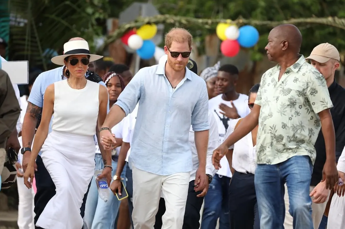 Meghan Markle and Prince Harry in San Basilio de Palenque during a visit around Colombia