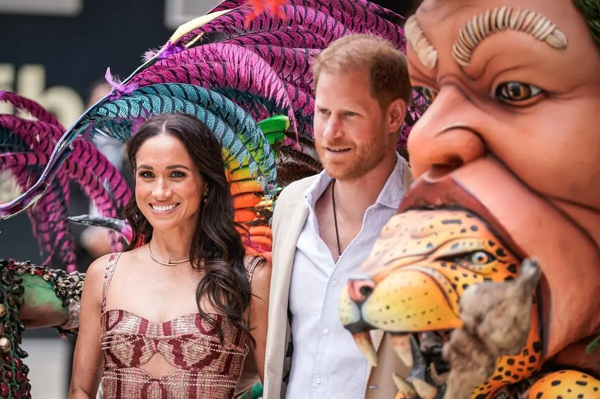 Meghan Markle and Prince Harry pose for a photo at Centro Nacional de las Artes Delia Zapata during a visit to Colombia