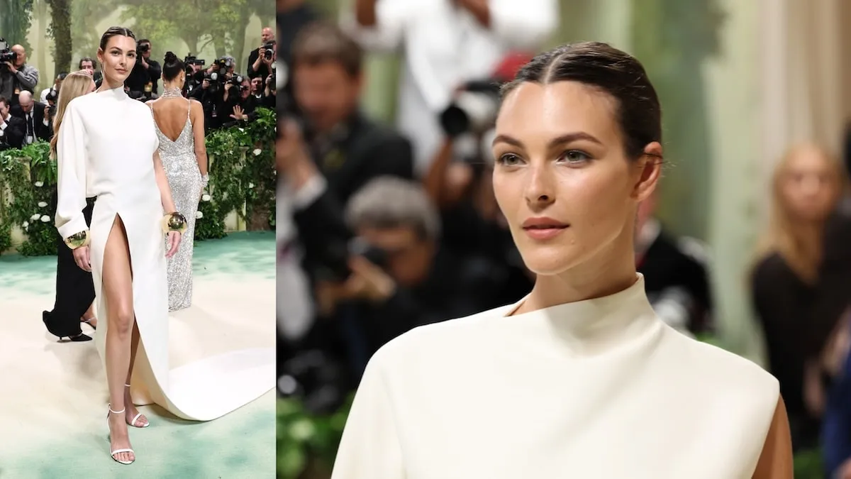 Wearing a white gown, Vittoria Ceretti poses on the Meta Gala red carpet