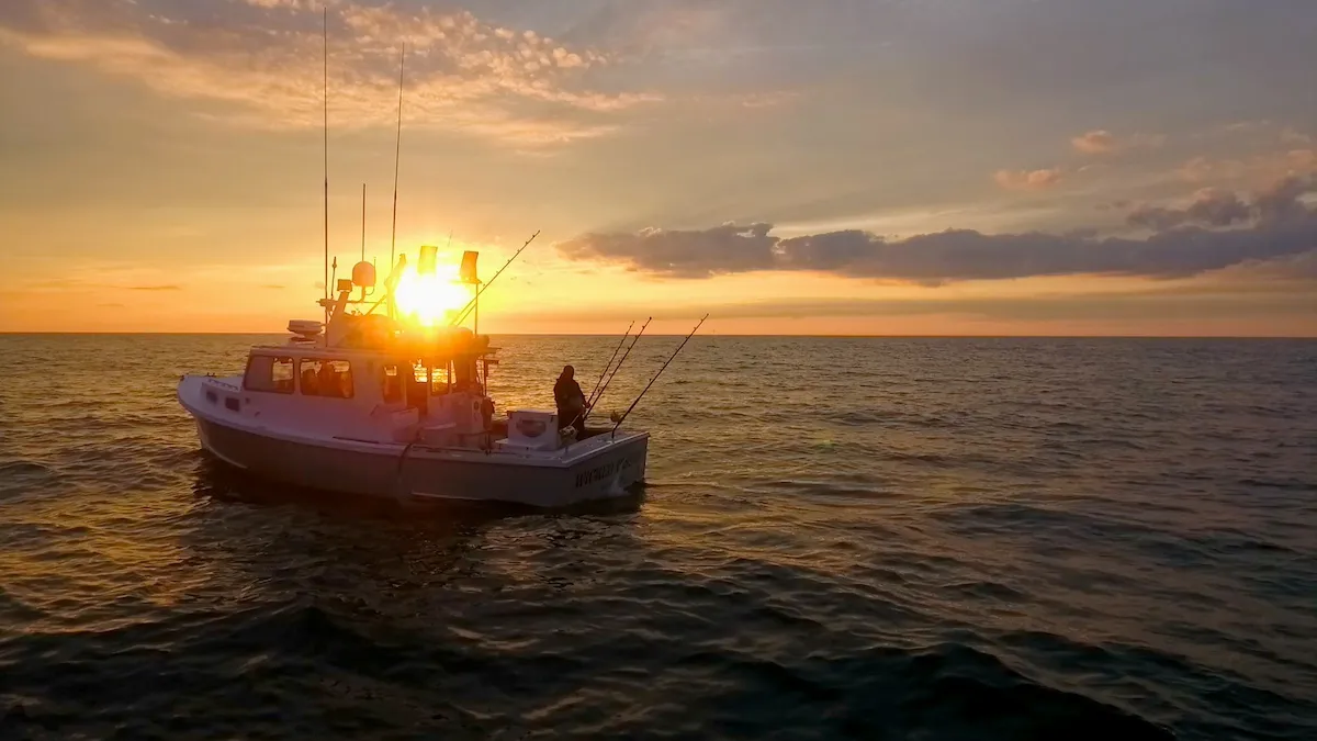 Fishing boat with sunset