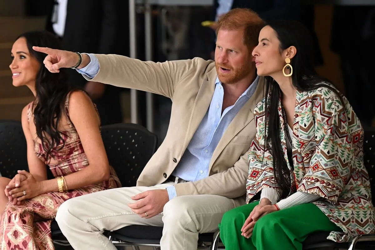 Prince Harry speaks with the director of the National Centre for the Arts, Xiomara Suescun, during visit to Bogota, Colombia