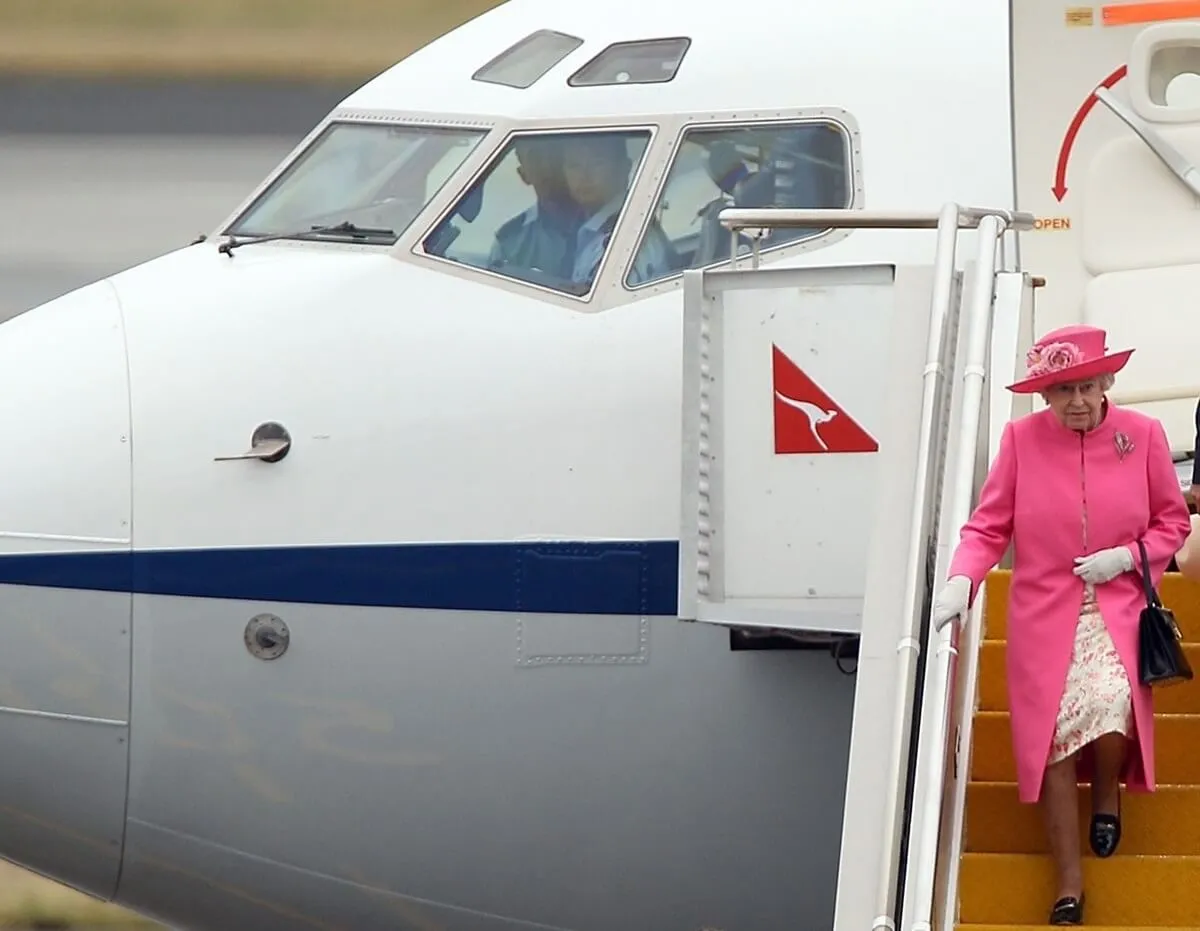 Queen Elizabeth II disembarks from the Royal Australian Force jet after landing at Perth International Airport