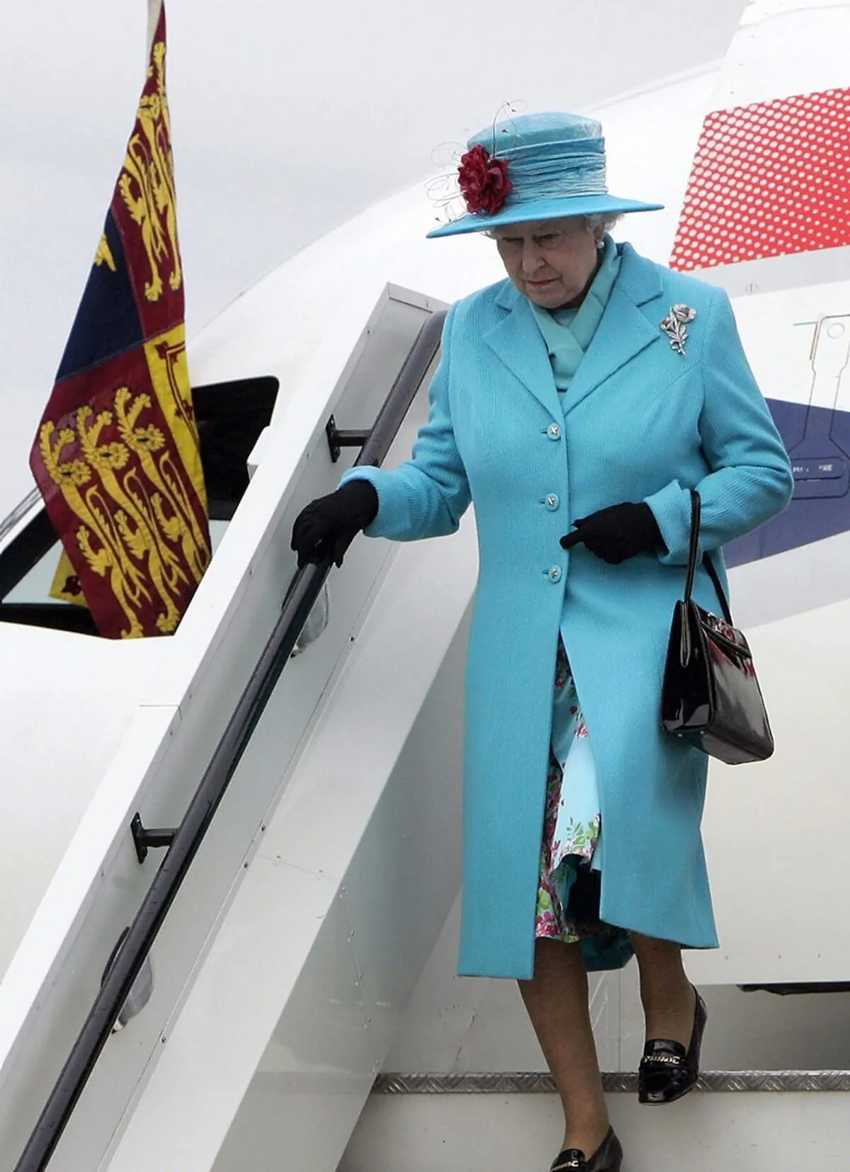 Queen Elizabeth II getting off the plane at the airport of Tallinn in Estonia