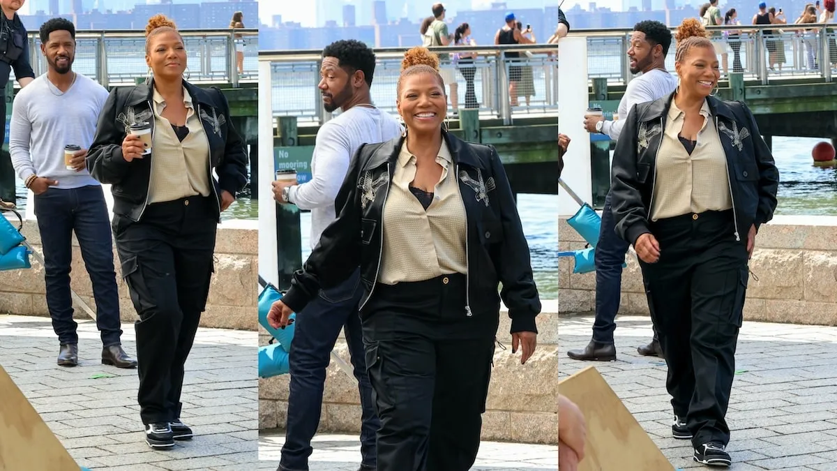 Tory Kittles and Queen Latifah film a scene for The Equalizer on Long Island City, Queens, with the NYC skyline behind them