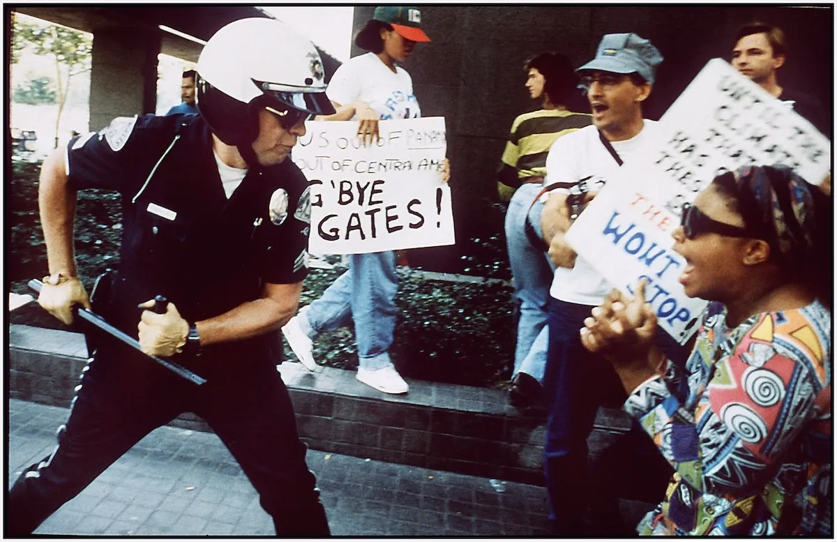 Police officer uses his baton on a protester during the Rodney King riots in LA in 1992