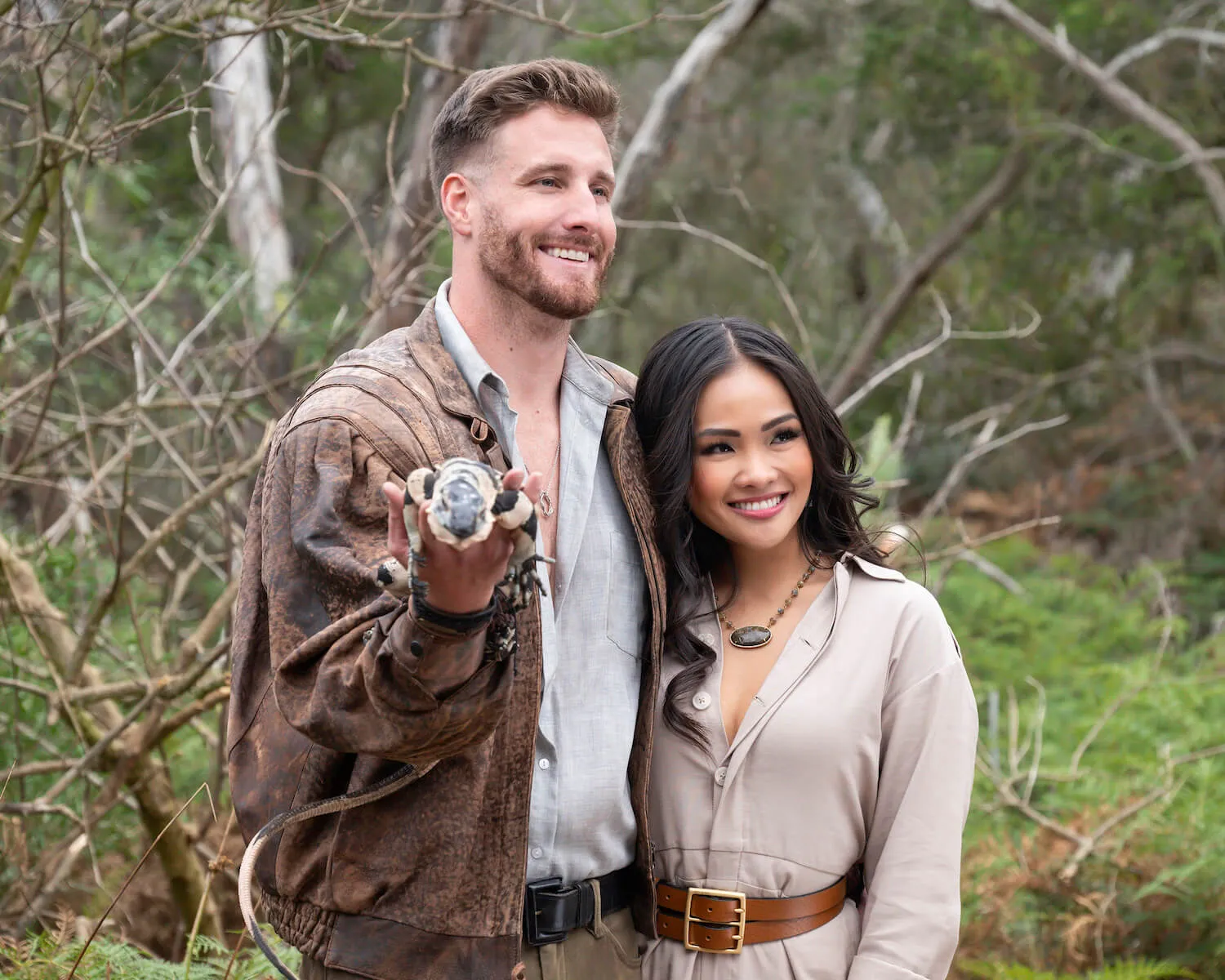 Sam McKinney holding a bird while posing with Jenn Tran in 'The Bachelorette' Season 21