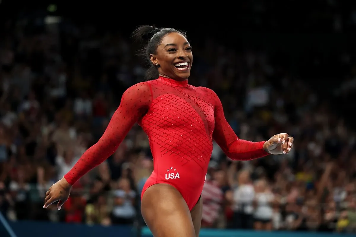 Simone Biles celebrates after finishing her routine during the Artistic Gymnastics Women's Vault Final at the 2024 Olympic Games in Paris