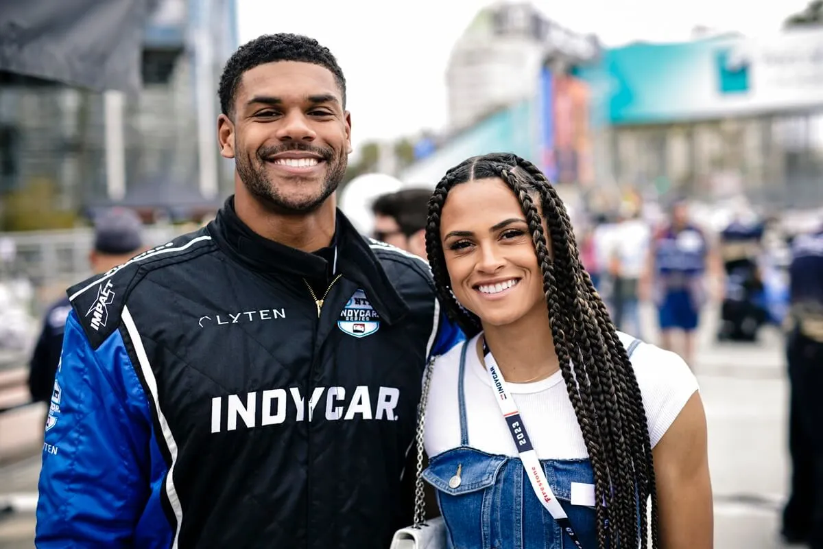 Sydney McLaughlin-Levronea and Andre Levrone Jr., attend the Indy car Experience at the Acura Grand Prix