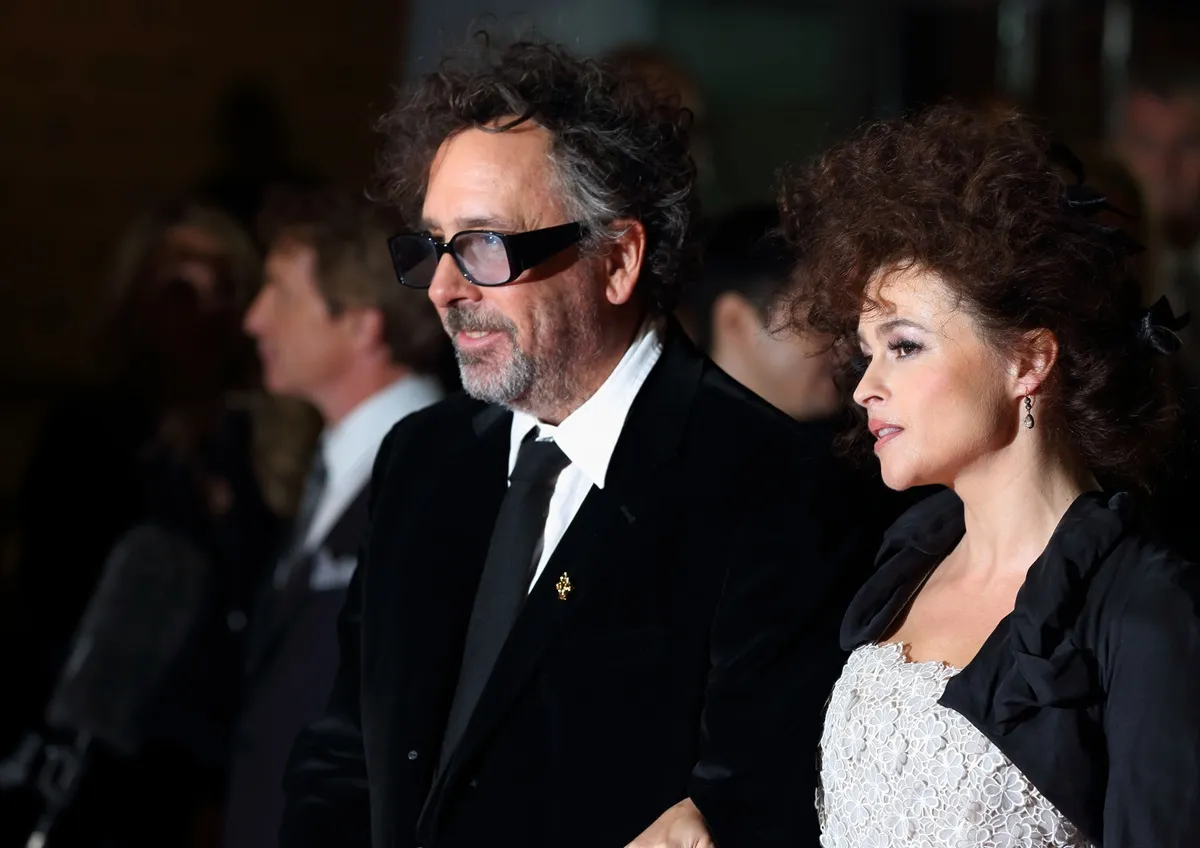 Tim Burton and Helena Bonham Carter attend the Premiere of 'Frankenweenie' at the opening of the BFI London Film Festival in matching outfits.