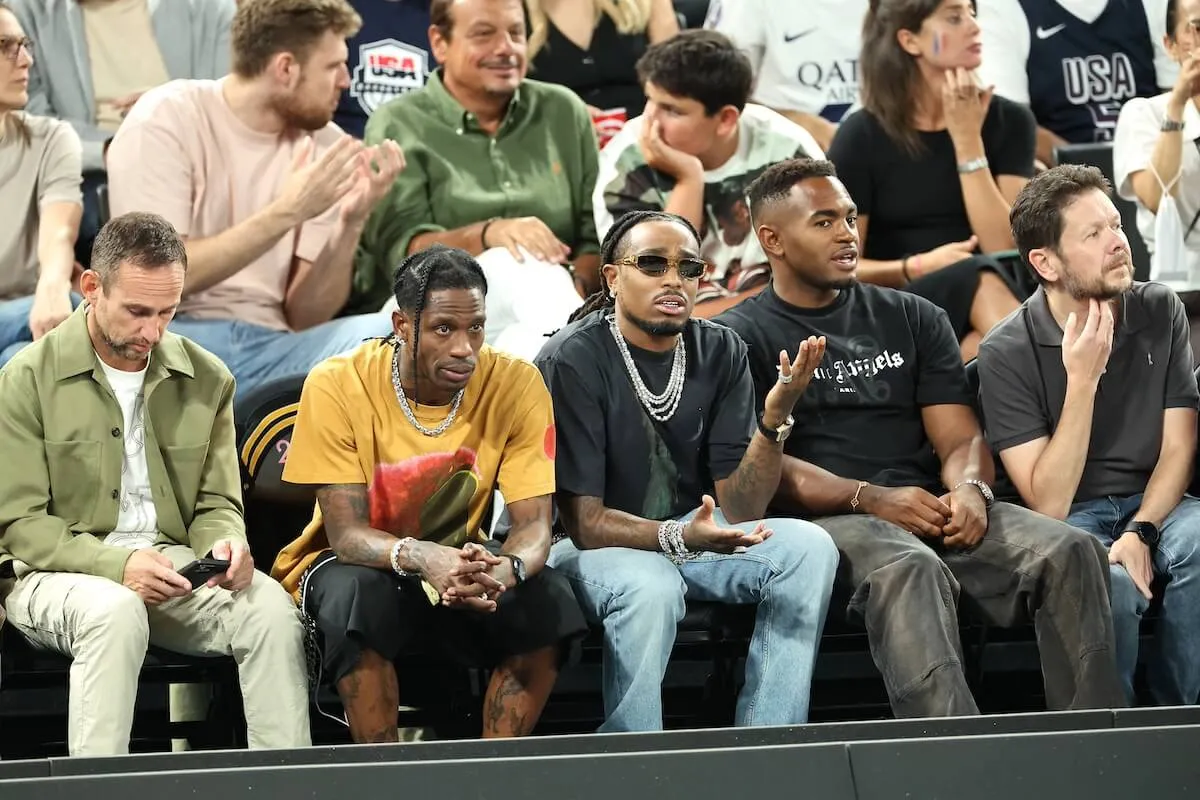 Travis Scott and Quavo watch a basketball game at the Olympics