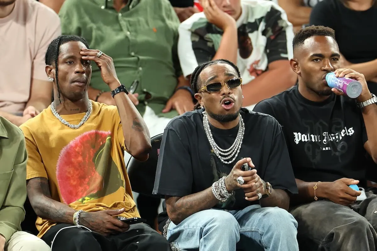 Travis Scott and Quavo watch a basketball game at the Olympics