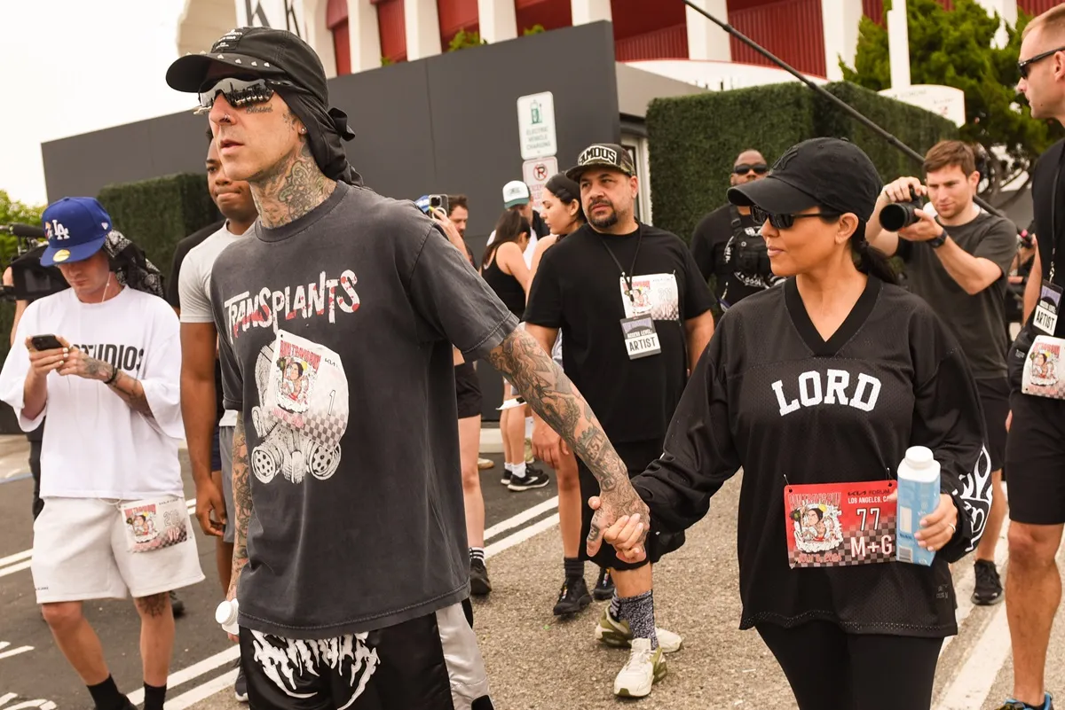 Travis Barker and Kourtney Kardashian (C) attend Travis Barker's Run Travis Run