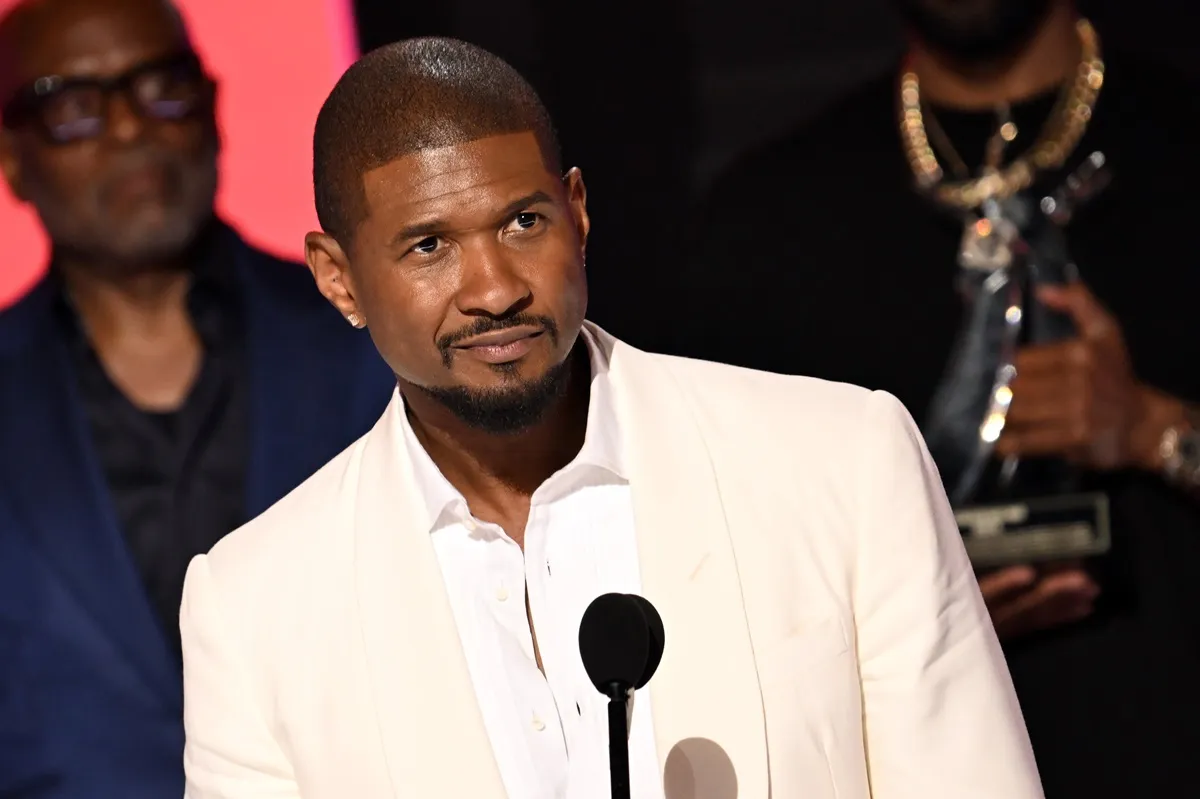 Usher in an all-white suit at the BET Awards.