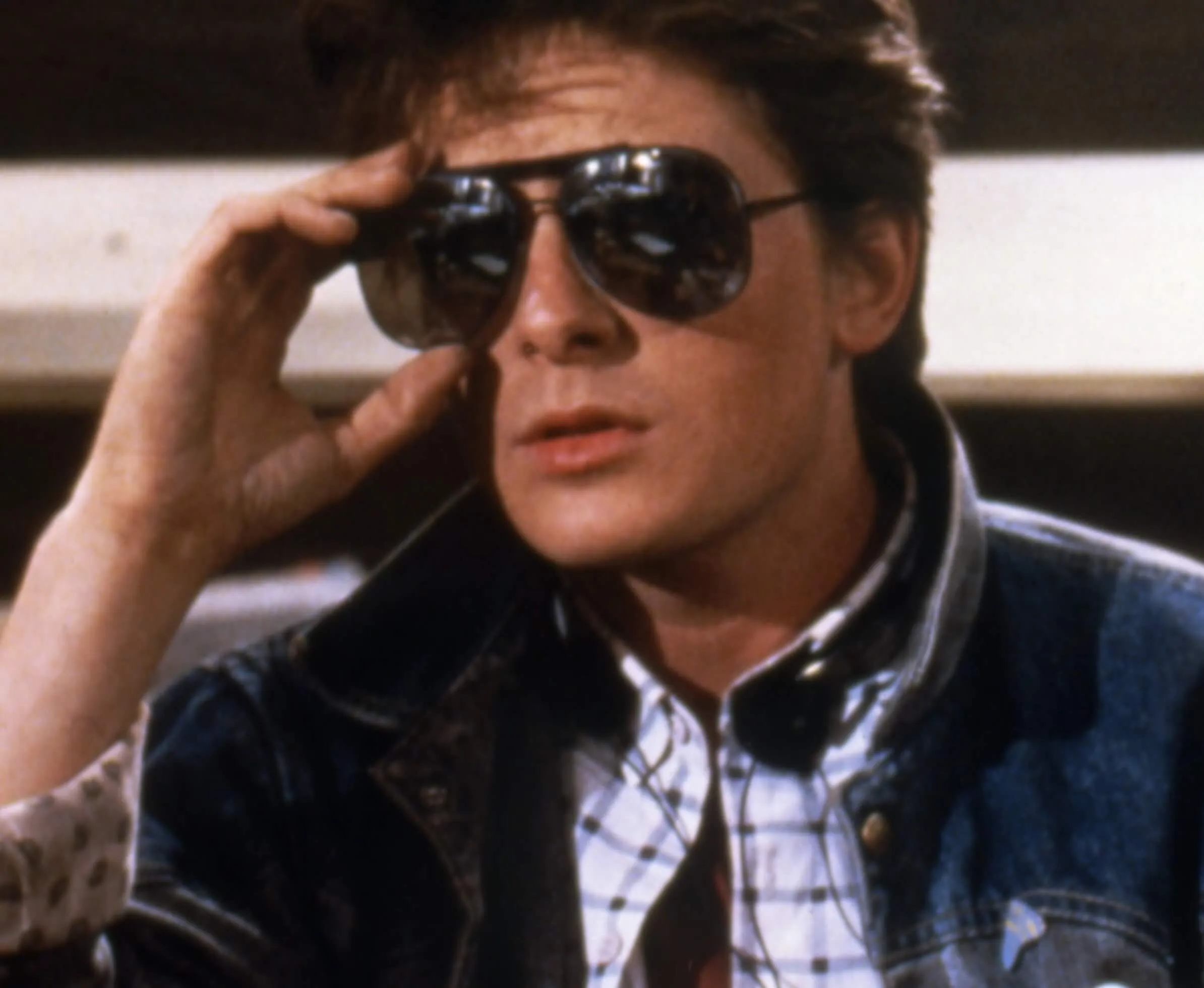 Michael J. Fox wearing sunglasses on the set of 'Back to the Future'