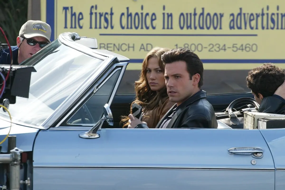 Ben Affleck seen on the set of 'Gigli' in a car next to Jennifer Lopez.