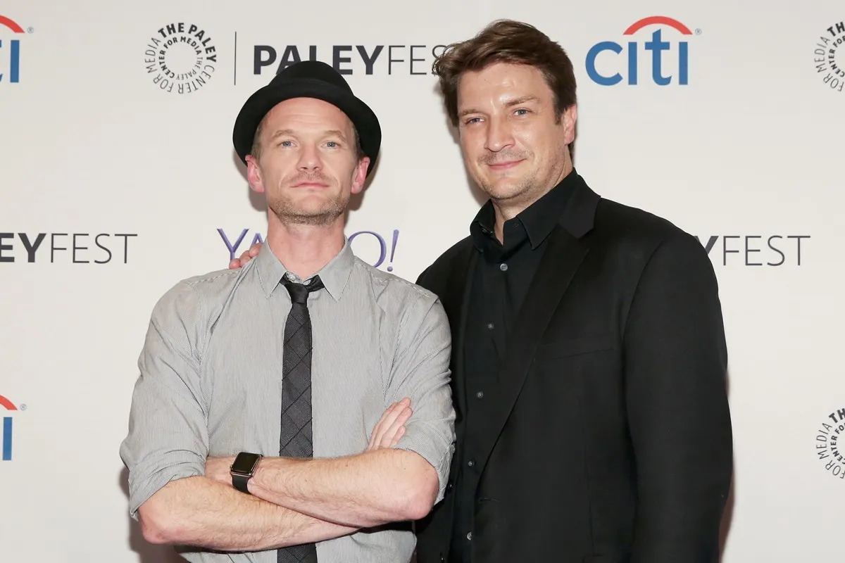 Nathan Fillion and Neil Patrick Harris posing together at PaleyFest.