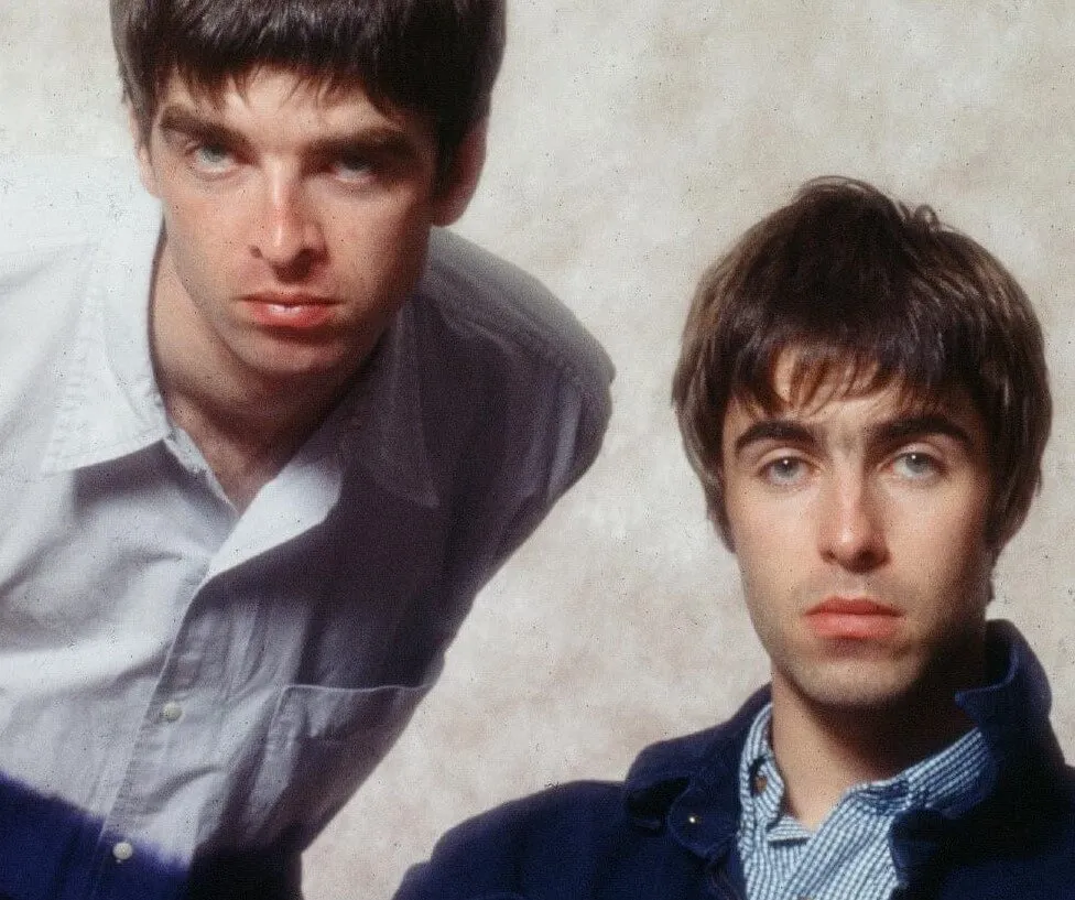 Oasis' Noel and Liam Gallagher staring at the camera