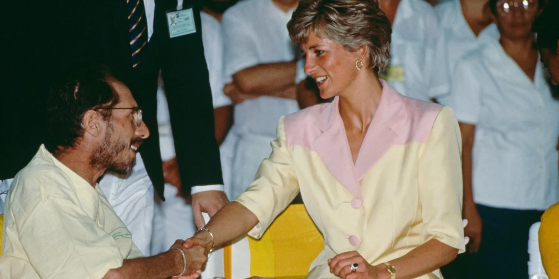 Princess Diana shakes hands with an AIDS patient in 1991.