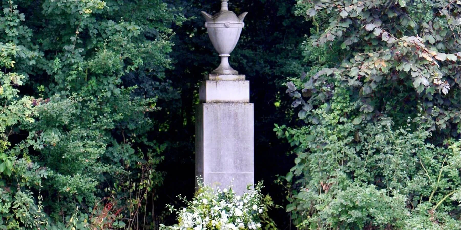 Princess Diana's gravesite is located in the center of oval lake at Althorp House.