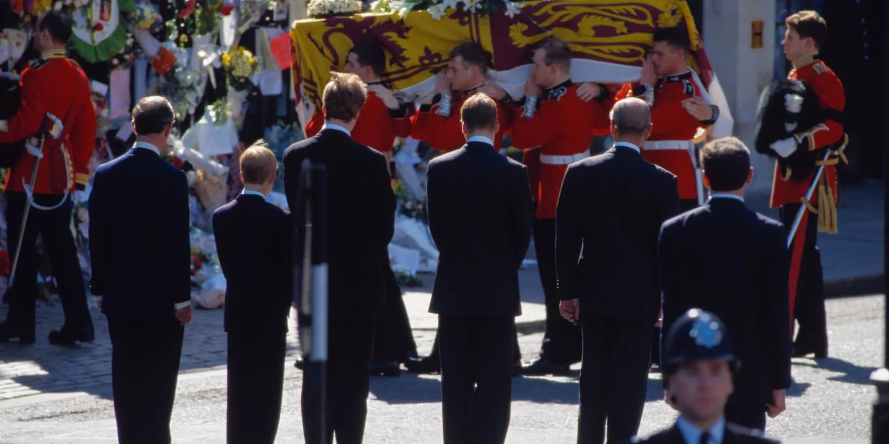 Prince Philip, Charles Spencer, Prince Charles, Prince William and Prince Harry walk behind Princess Diana's casket.