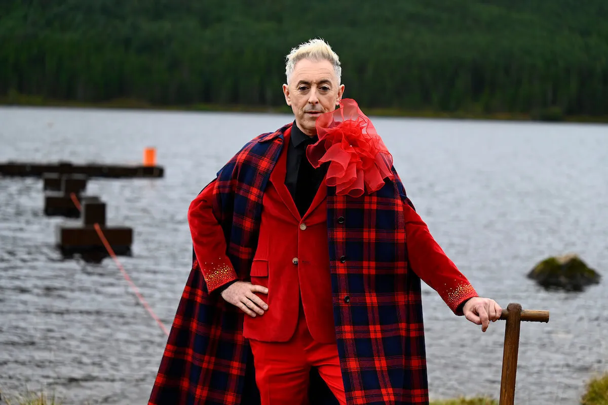 Alan Cumming, whose outfit in 'The Traitors' Season 3 resembles Taylo Swift's VMAs outfit, wears red plaid in season 2 of the reality show