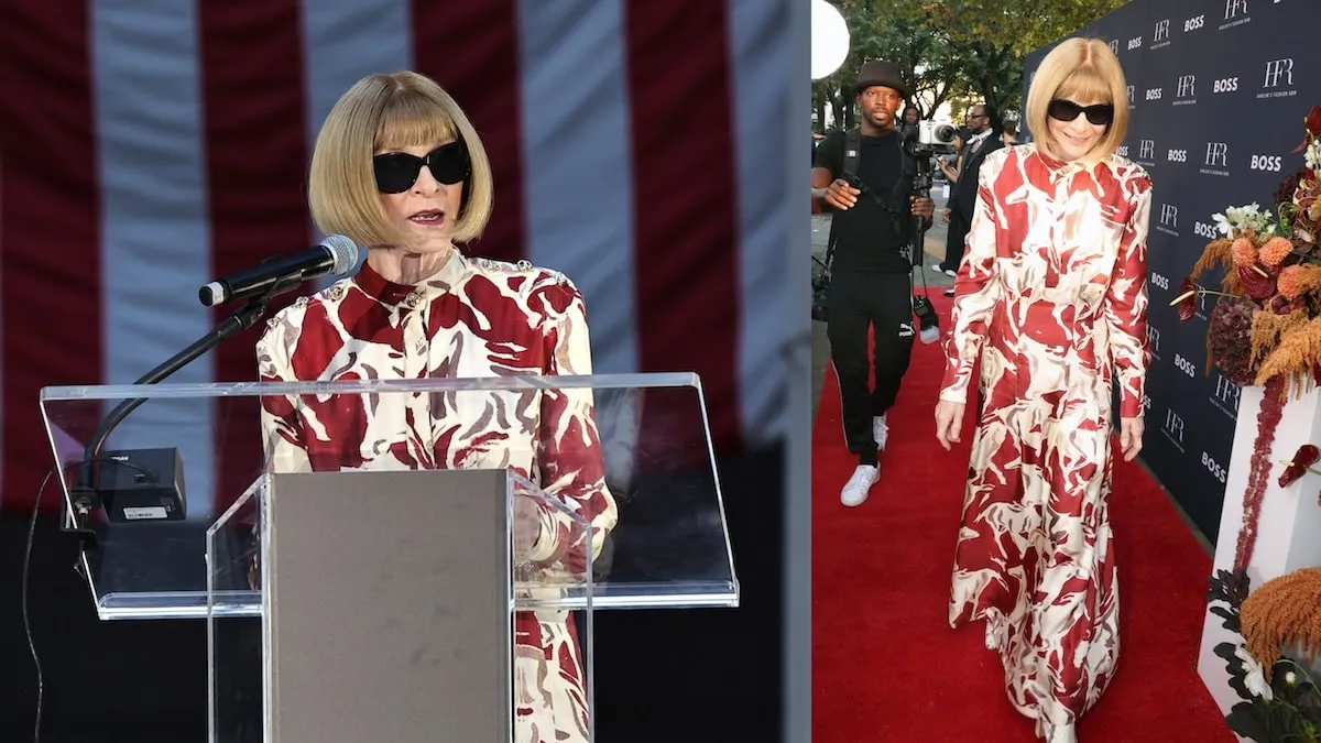 Wearing a red and white dress, Anna Wintour speaks during the Fashion Show & Style Awards in Harlem