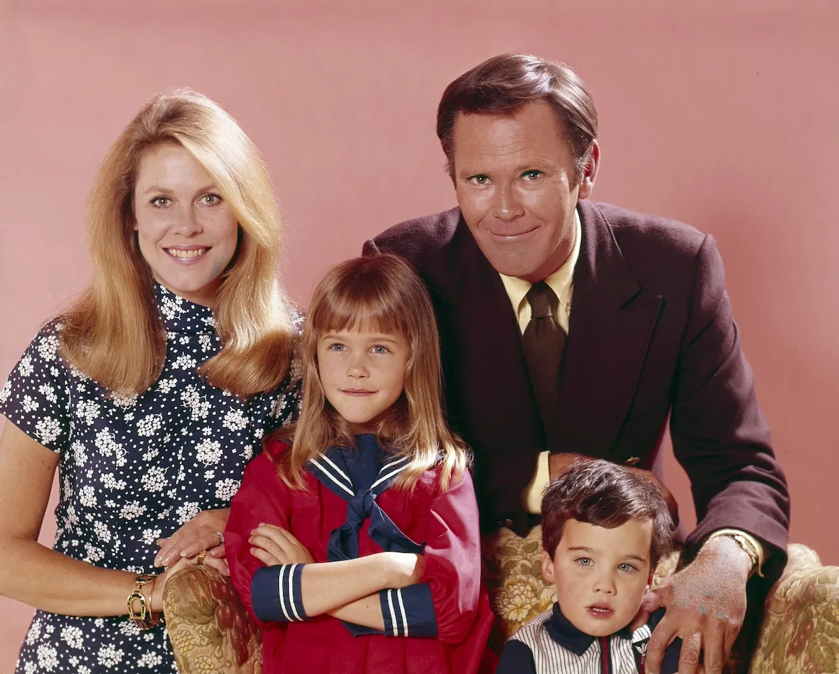 Portrait of Samantha and Darrin and their two children, including Tabitha, on 'Bewitched'