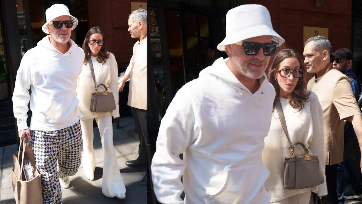 Wearing eggshell white outfits, Brad Pitt and Ines de Ramon step onto an NYC street while holding hands