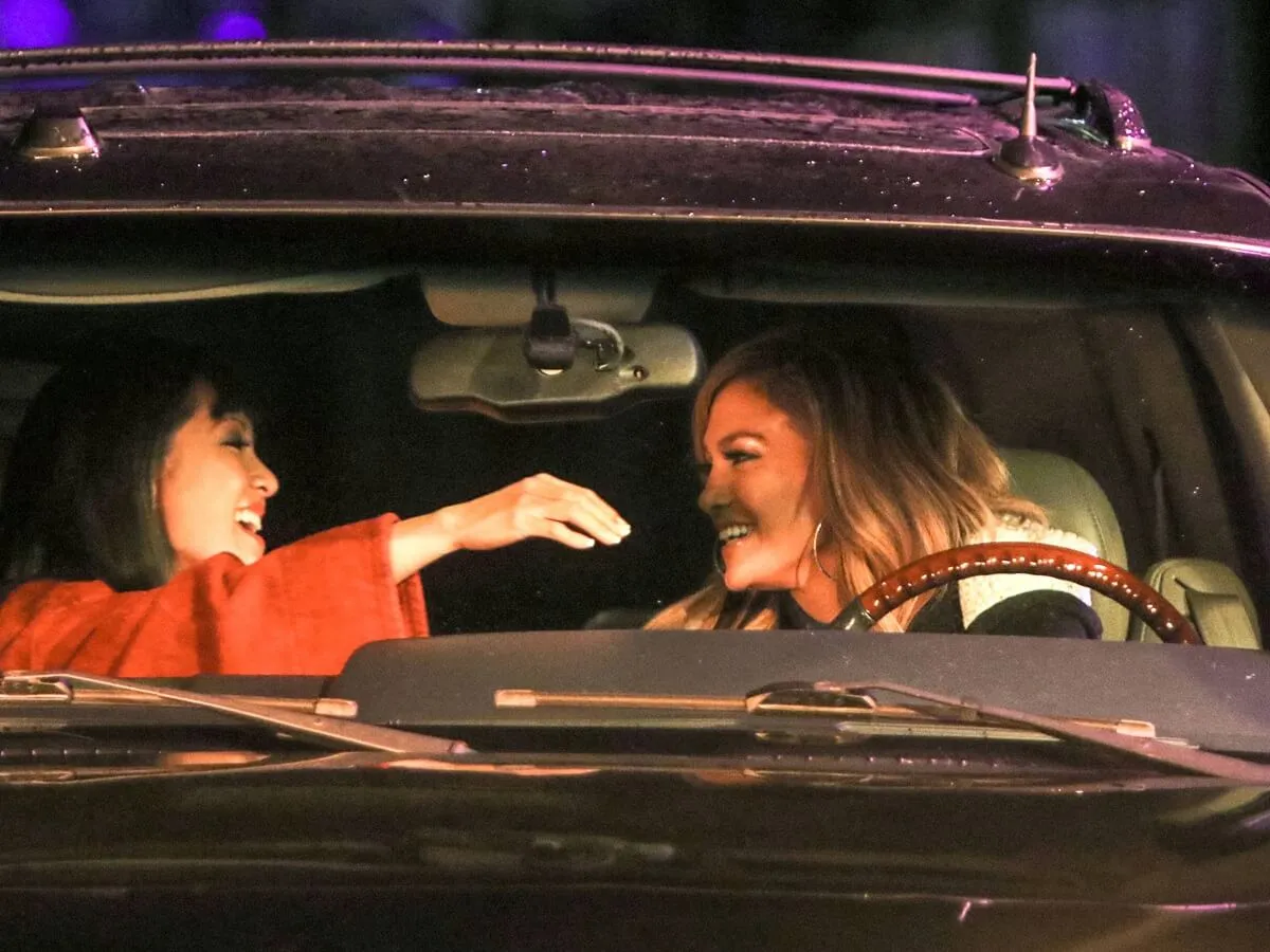 Constance Wu and Jennifer Lopez seen on the set of 'Hustlers'.