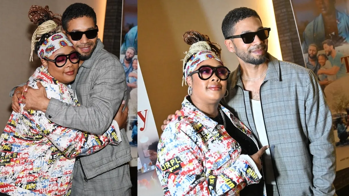 Rapper Da Brat and Jussie Smollett hug each other at the Atlanta premiere of "The Lost Holliday"