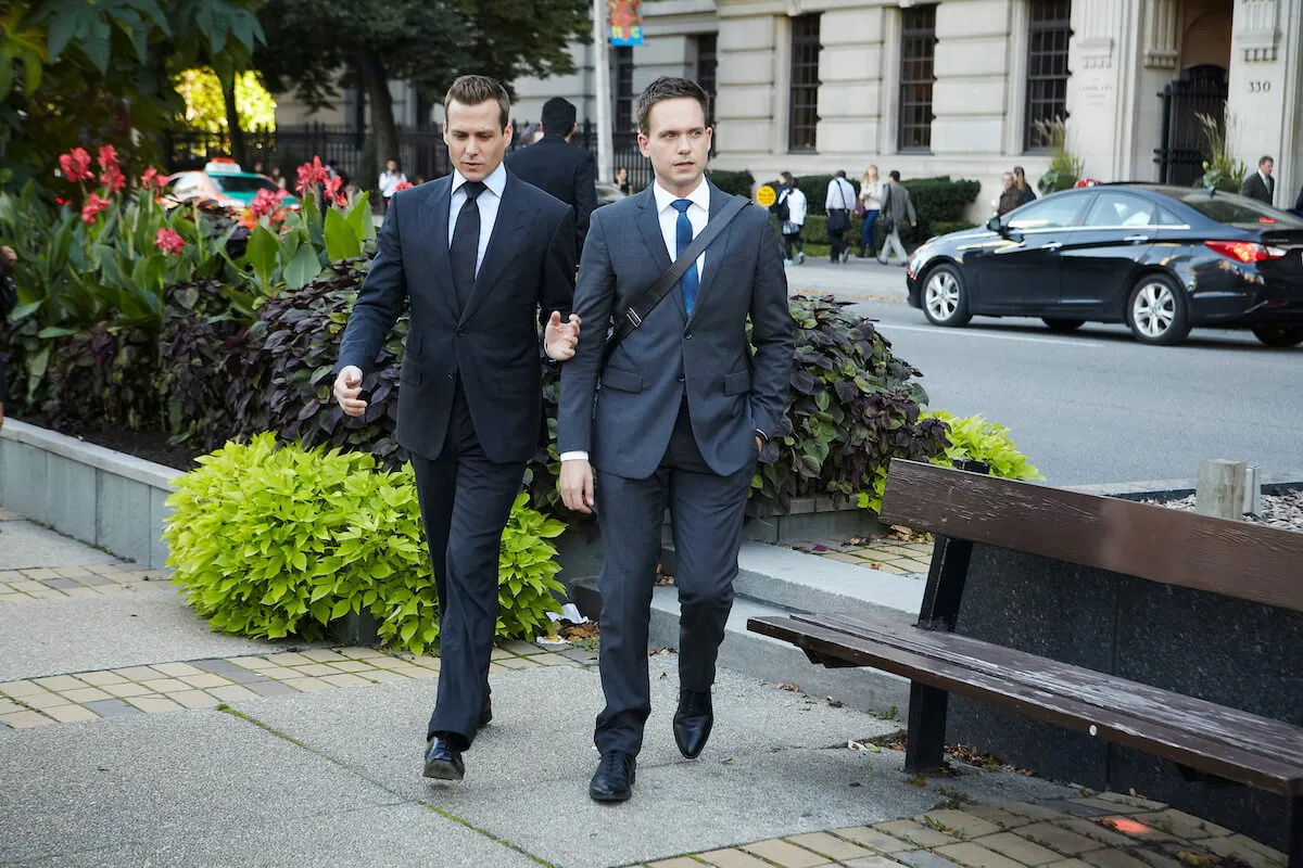 Gabriel Macht and Patrick J. Adams, who didn't watch 'Suits,' in a scene from the legal drama