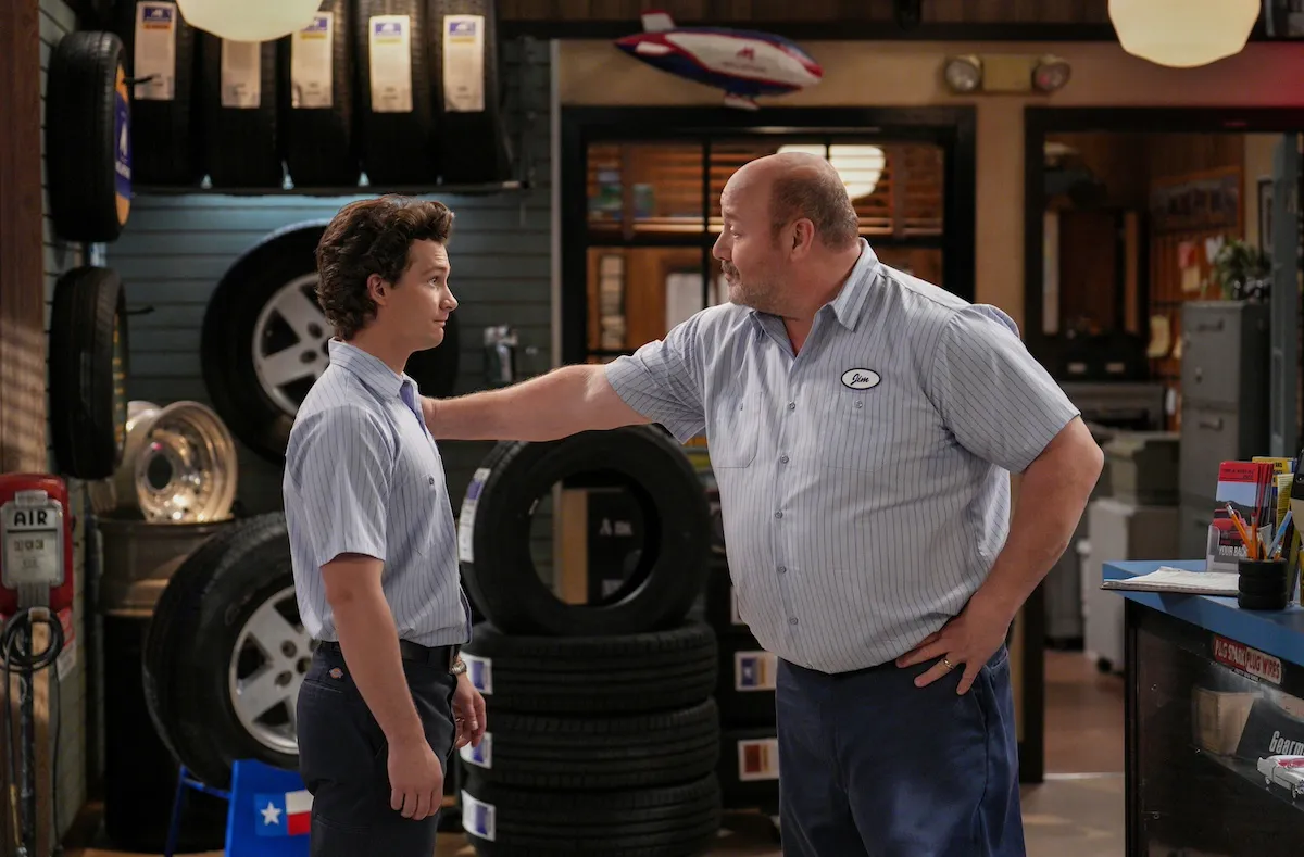 Mandy's dad talking to Georgie at tire shop