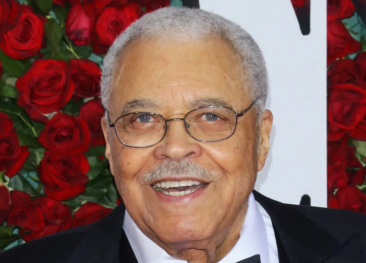 James Earl Jones, who has some of his iconic movies streaming right now, smiles and looks on wearing a tuxedo.