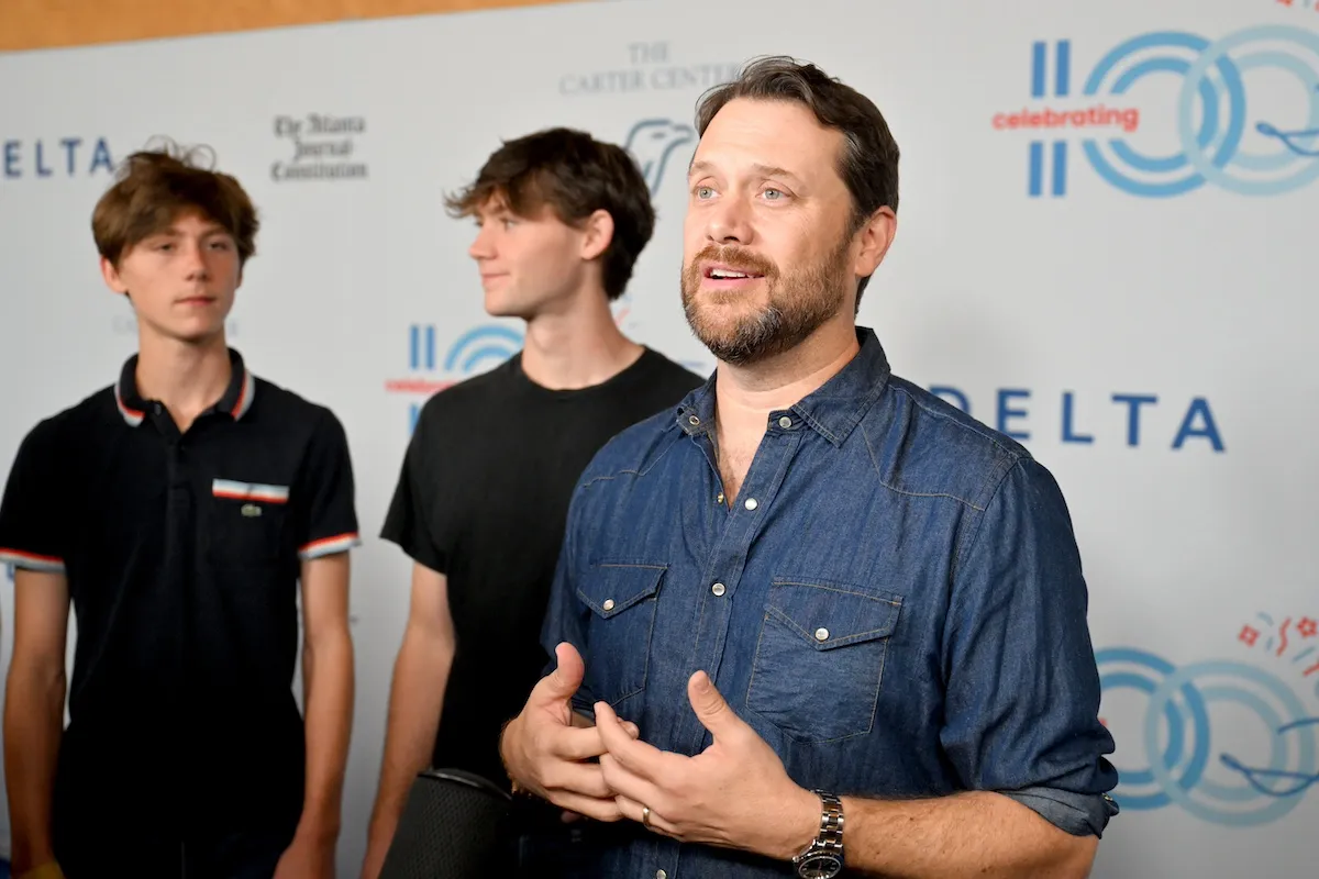 Jason Carter talks to a reporter on the red carpet