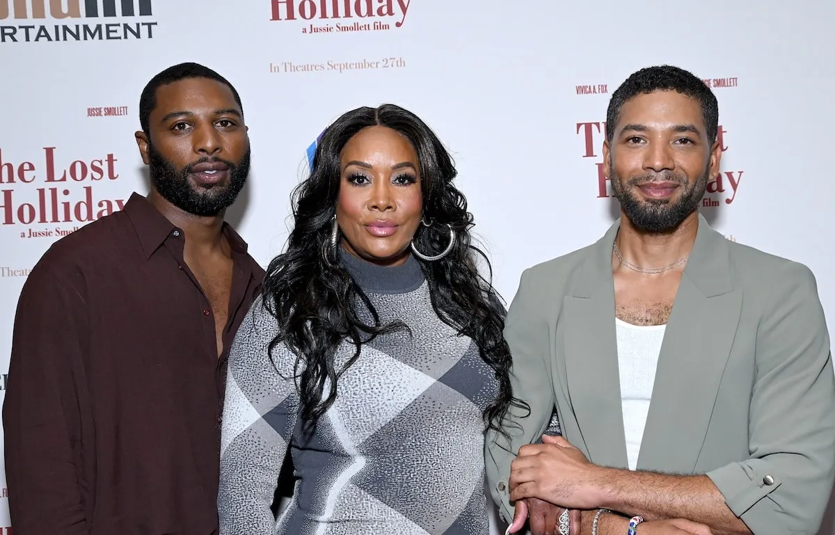 Actors Jabari Redd, Vivica A. Fox, and Jussie Smollett stand together on the red carpet at The Grove